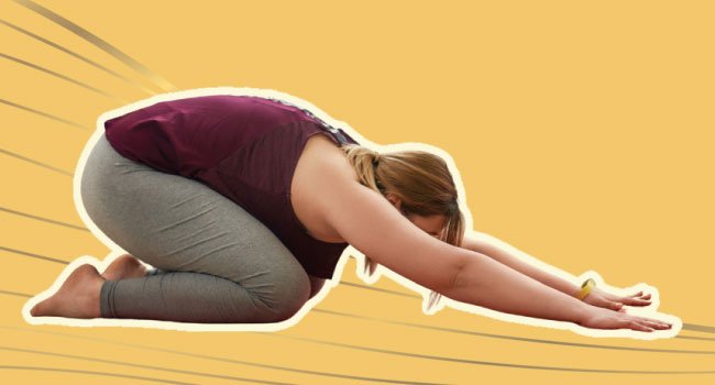 SHE RECOVERS Embodiment Studio woman doing child's pose yoga SHE RECOVERS Embodiment Studio woman doing child's pose yoga