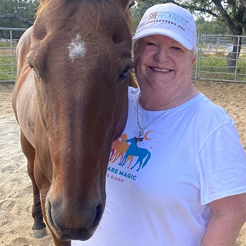 Portrait of SHE RECOVERS GEM Nancy McKay with her Horse Rugger